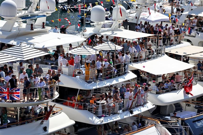 Guests enjoying yacht hospitality in Monaco harbour